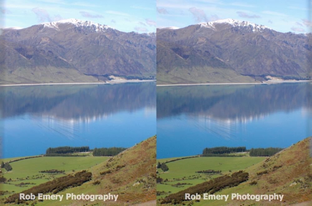 view of mountains and mirror flat lake