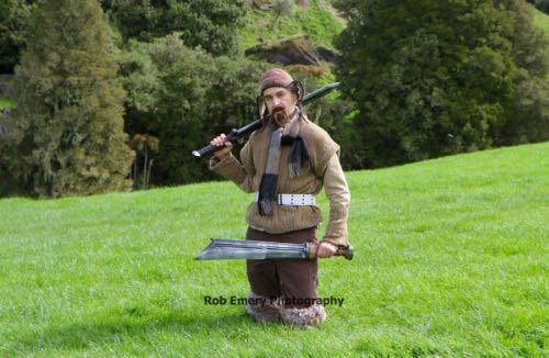 Bofur with orc weapons in a field